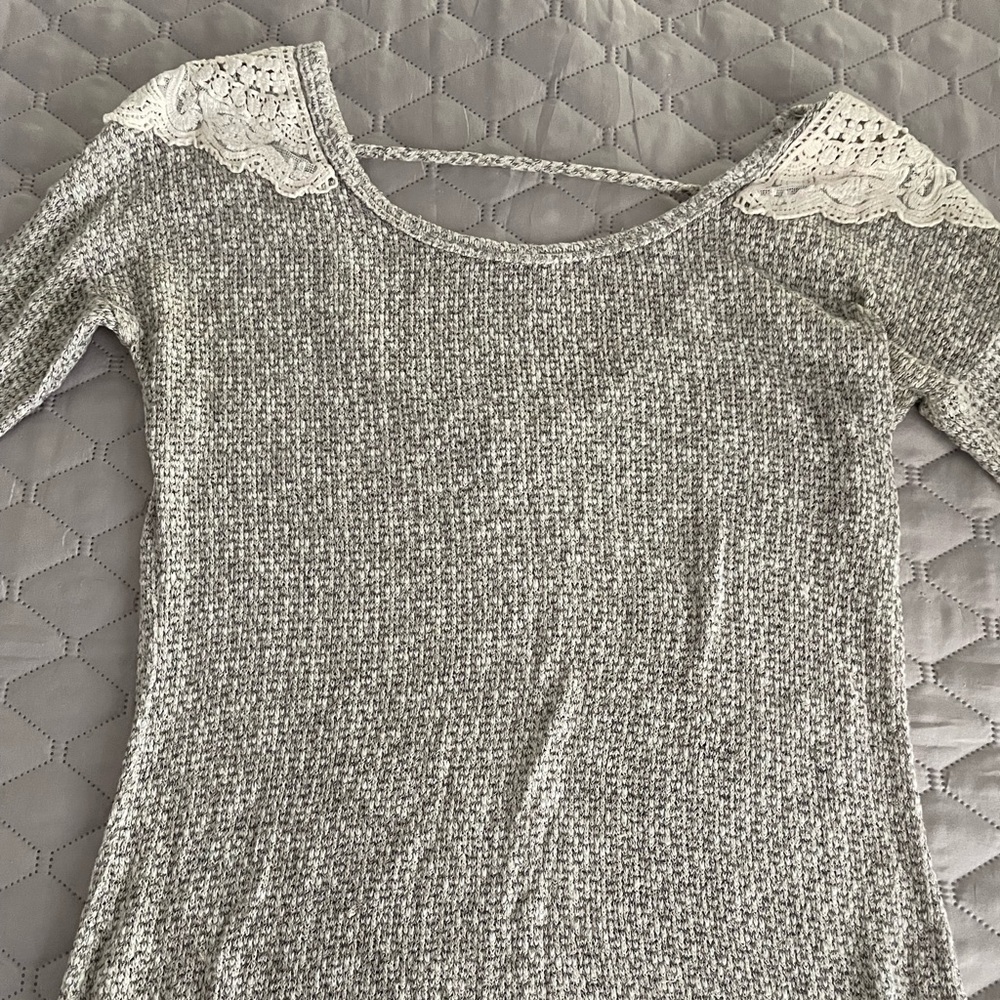 Grey, white and tan with lace trim.